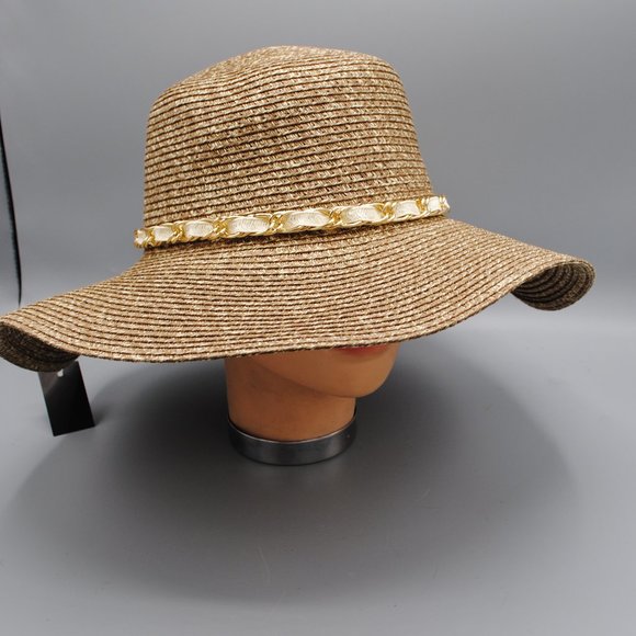 white and gold floppy hat